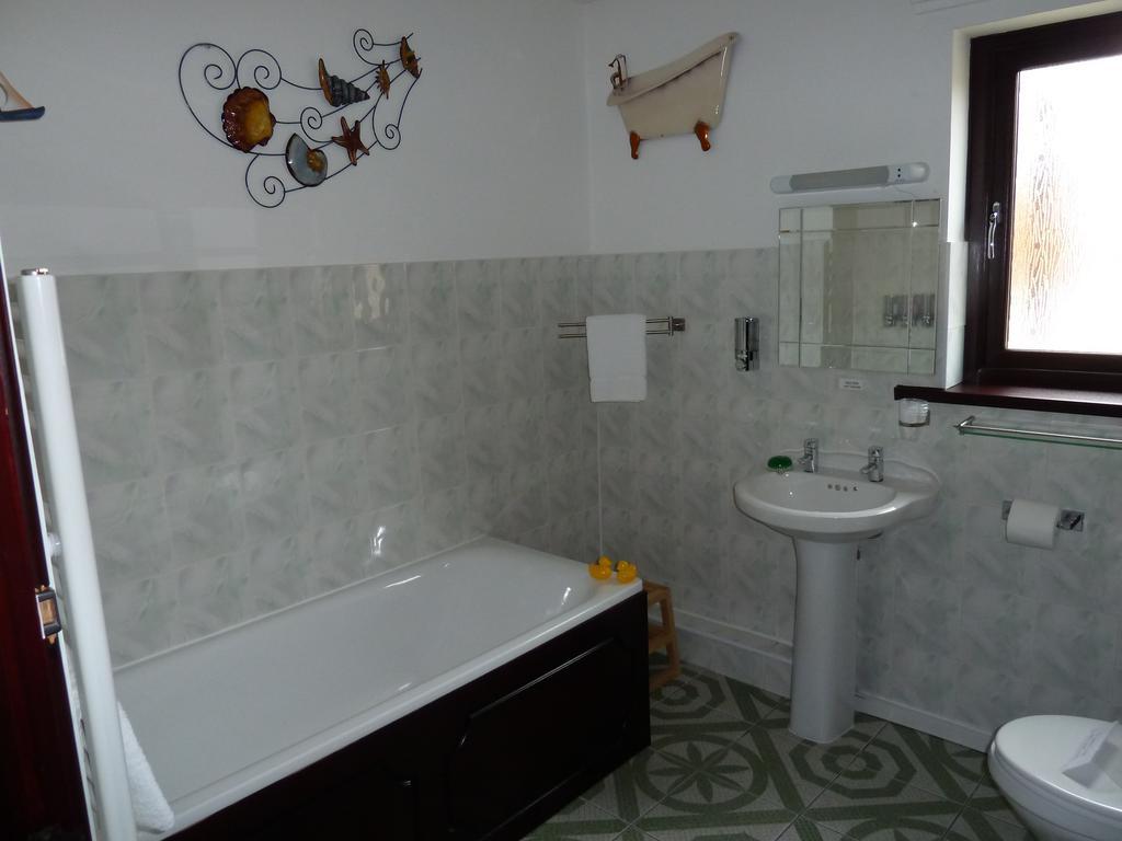 Smithy Lodge Guest House Leyland Esterno foto